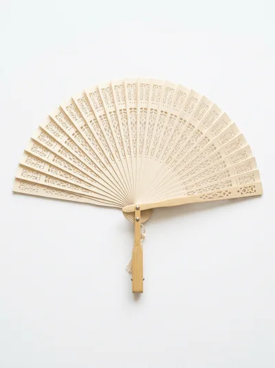 Intricate Wooden Hand Fan On White Background