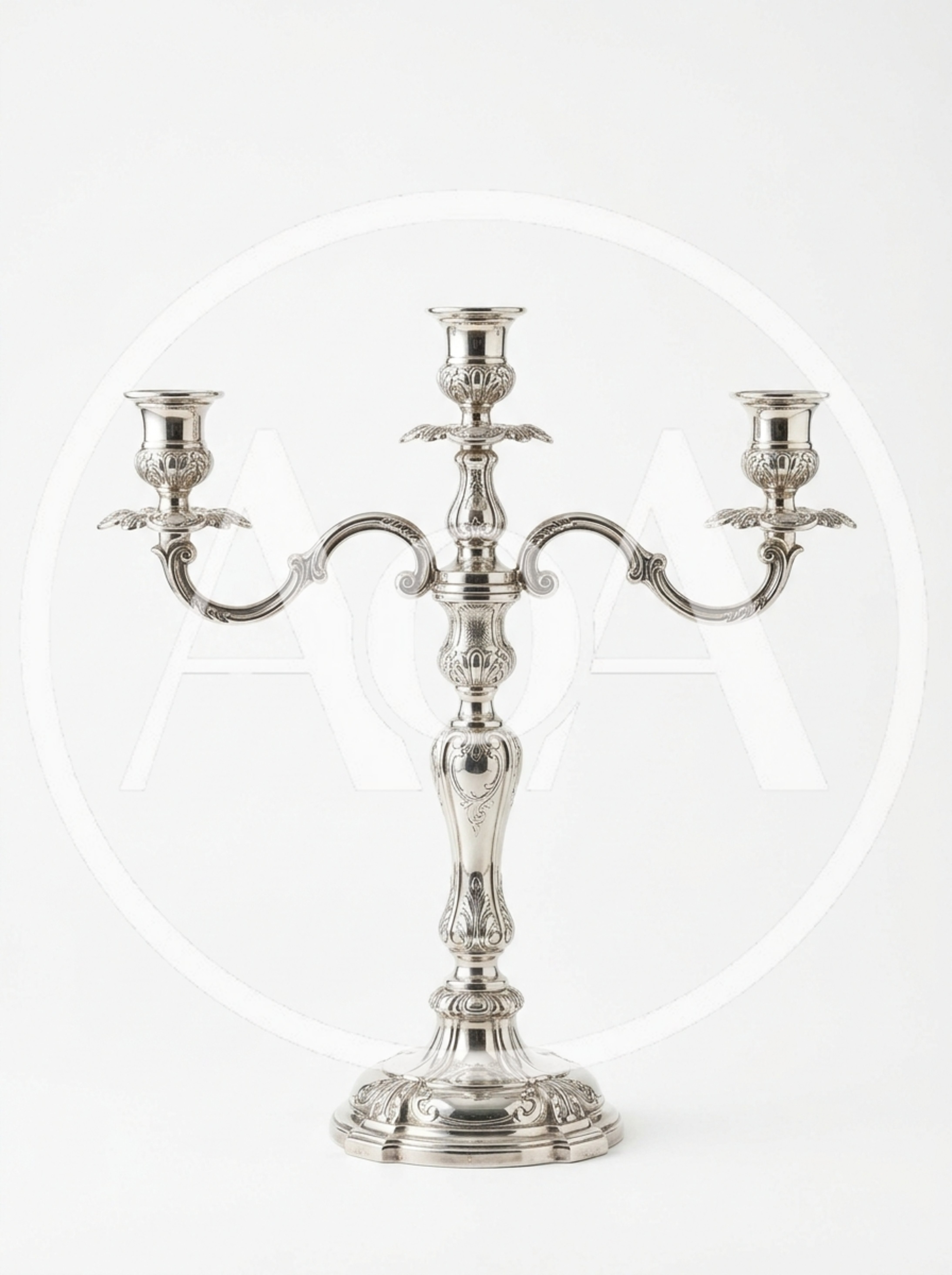 Ornate Silver Candelabra Against A Plain White Background