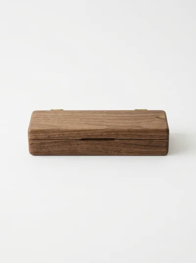 Closed Rectangular Wooden Box On White Background
