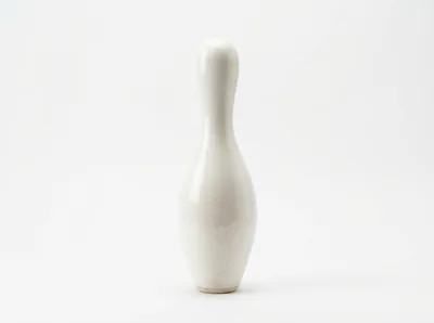 Single White Bowling Pin On White Background