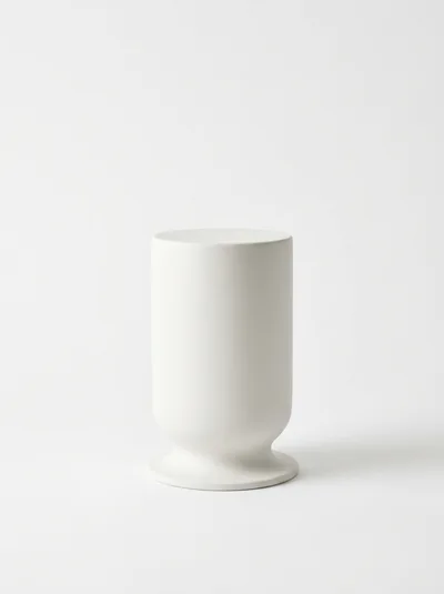 Minimalist White Ceramic Cylinder Vase On White Background