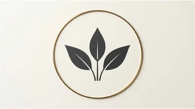 Minimalist Leaf Illustration In A Gold Circular Frame