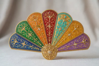 Ornate Decorative Hand Fan With Intricate Filigree Details
