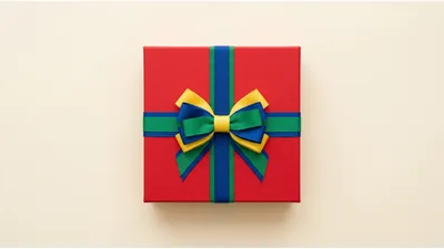 Red Gift Box With Multicolored Ribbon Bow