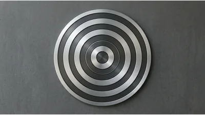 Abstract Concentric Metal Circles On Concrete Background