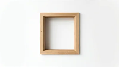 Empty Wooden Picture Frame On White Wall