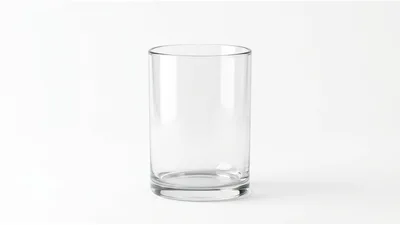 Empty Clear Glass Tumbler On White Background
