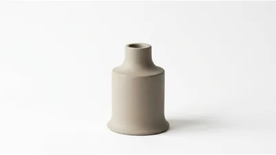 Minimalist Matte Beige Ceramic Vase On White Background