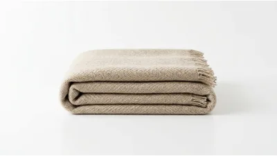 Folded Beige Herringbone Wool Throw Blanket