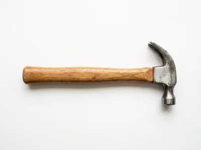 Claw Hammer With Wooden Handle On White Background
