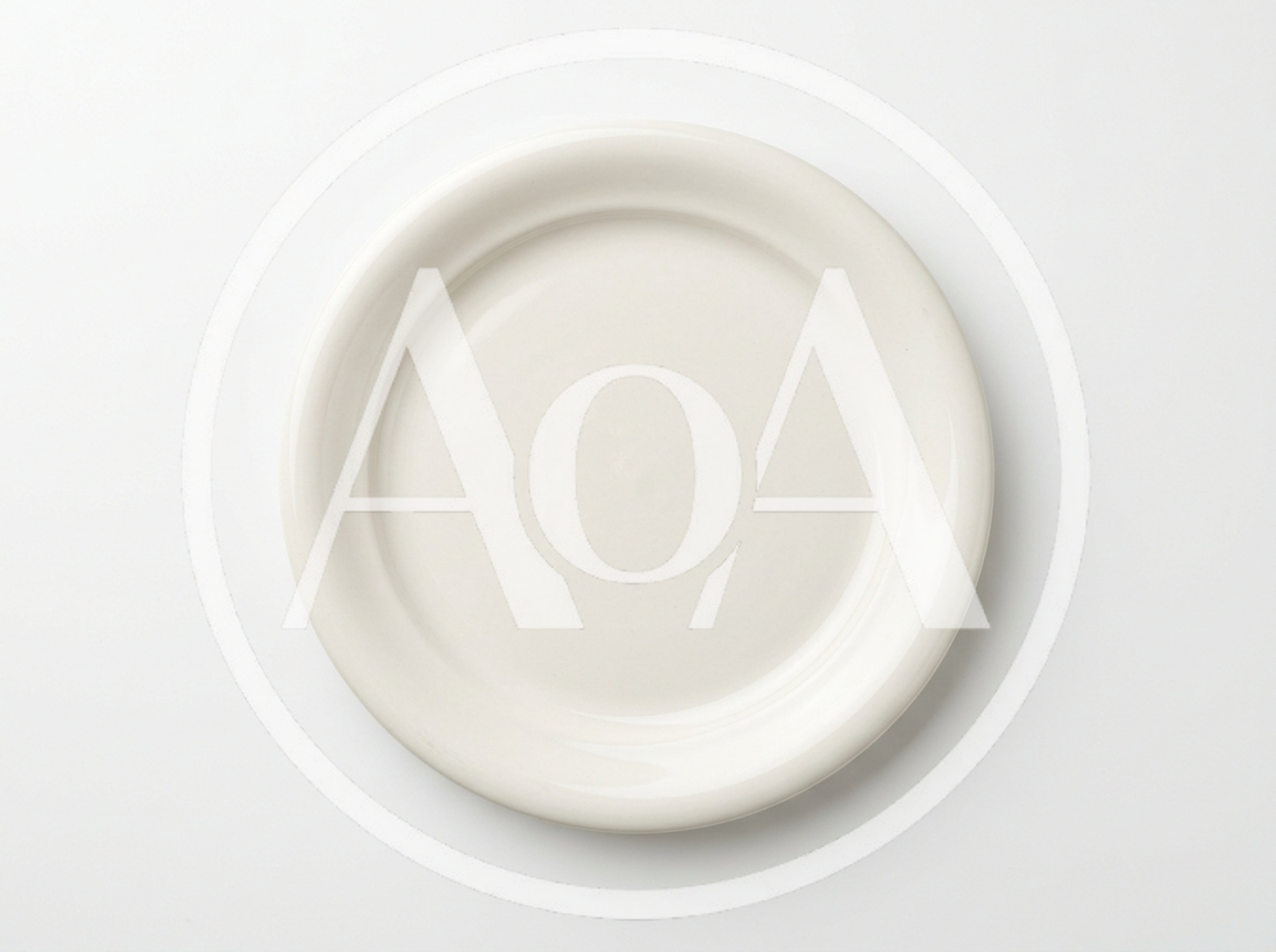 Empty White Ceramic Plate On White Background