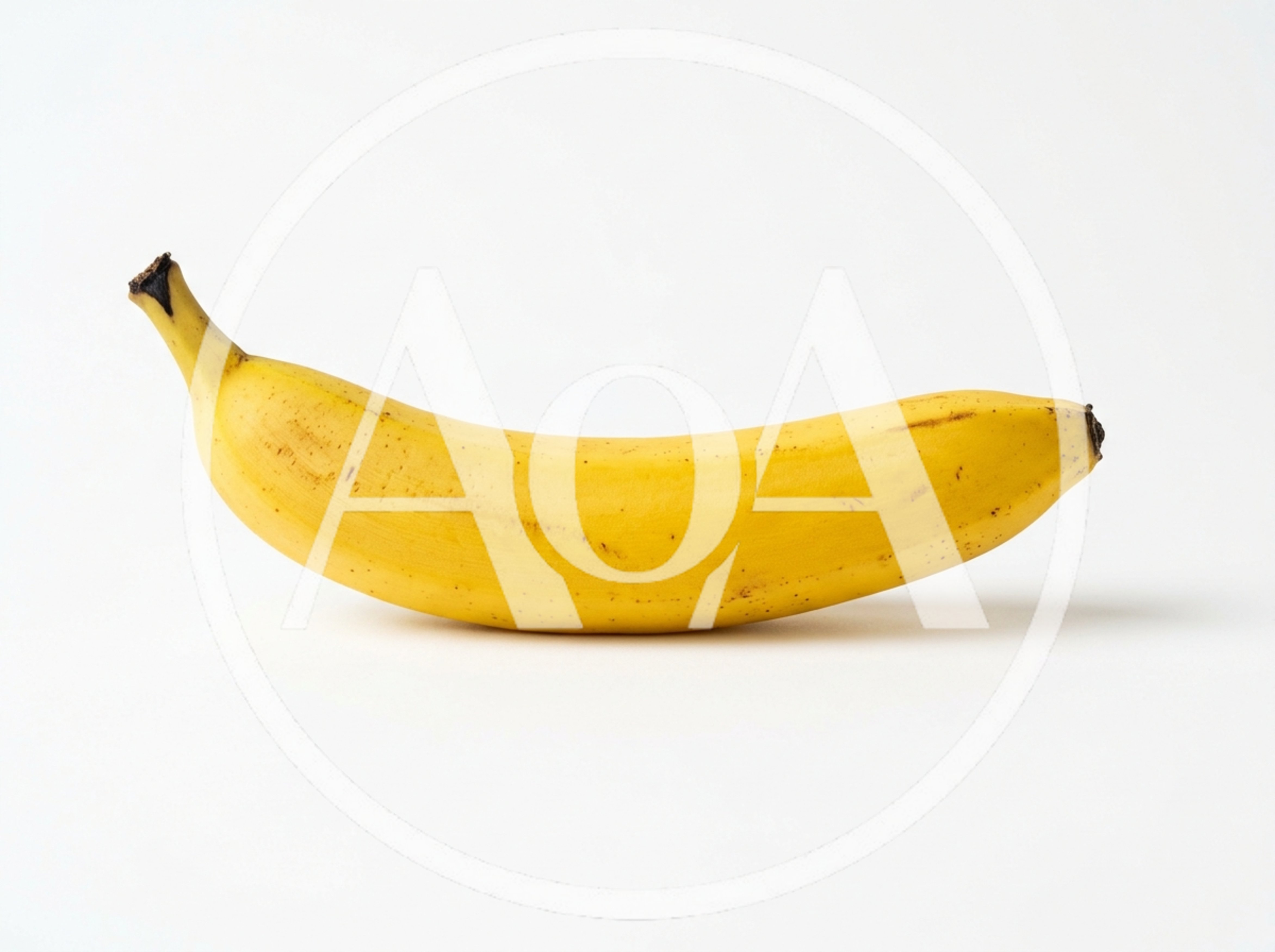 Single Ripe Yellow Banana on White Background