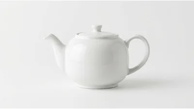 White Ceramic Teapot On A Plain Background