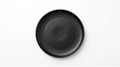 Empty Black Ceramic Plate On White Background