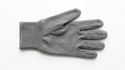 Single Gray Cotton Work Glove Isolated