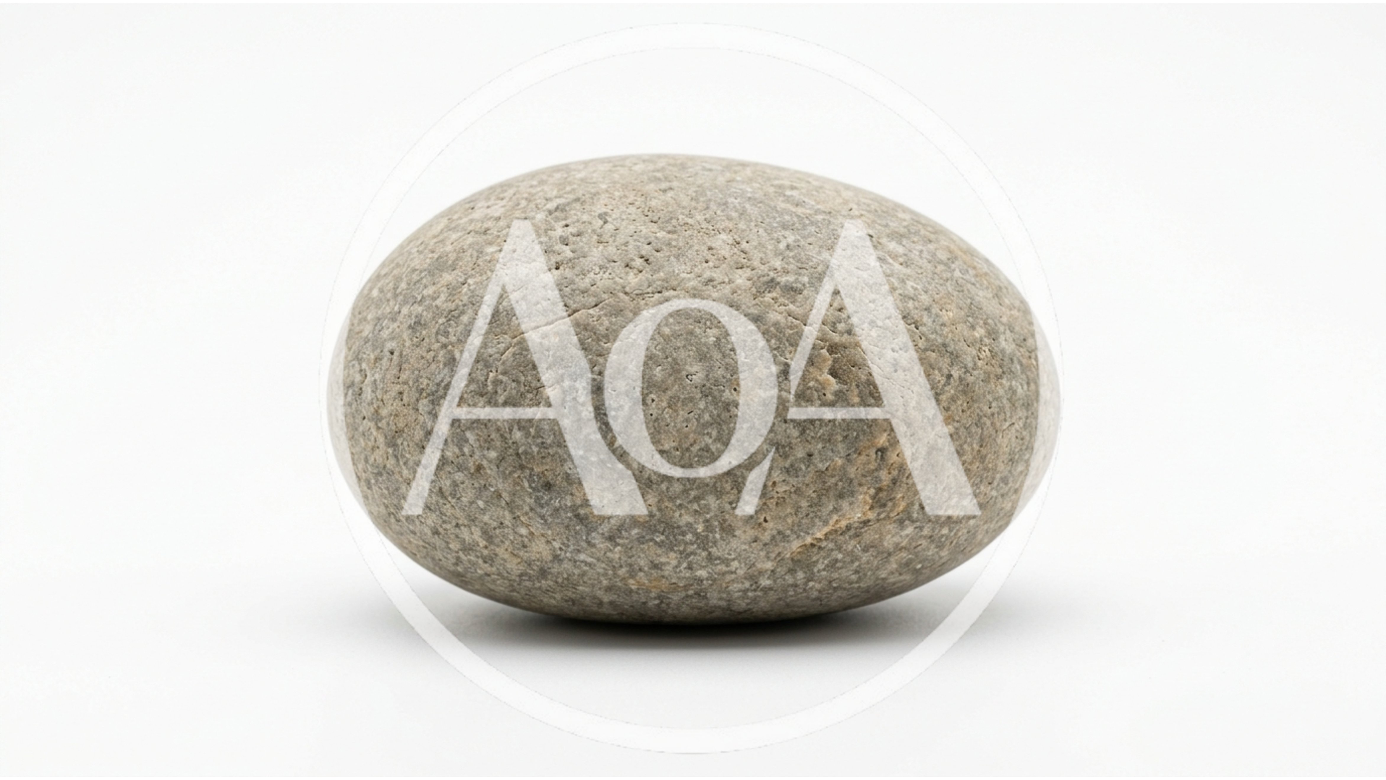 Single Smooth Grey River Stone On White Background