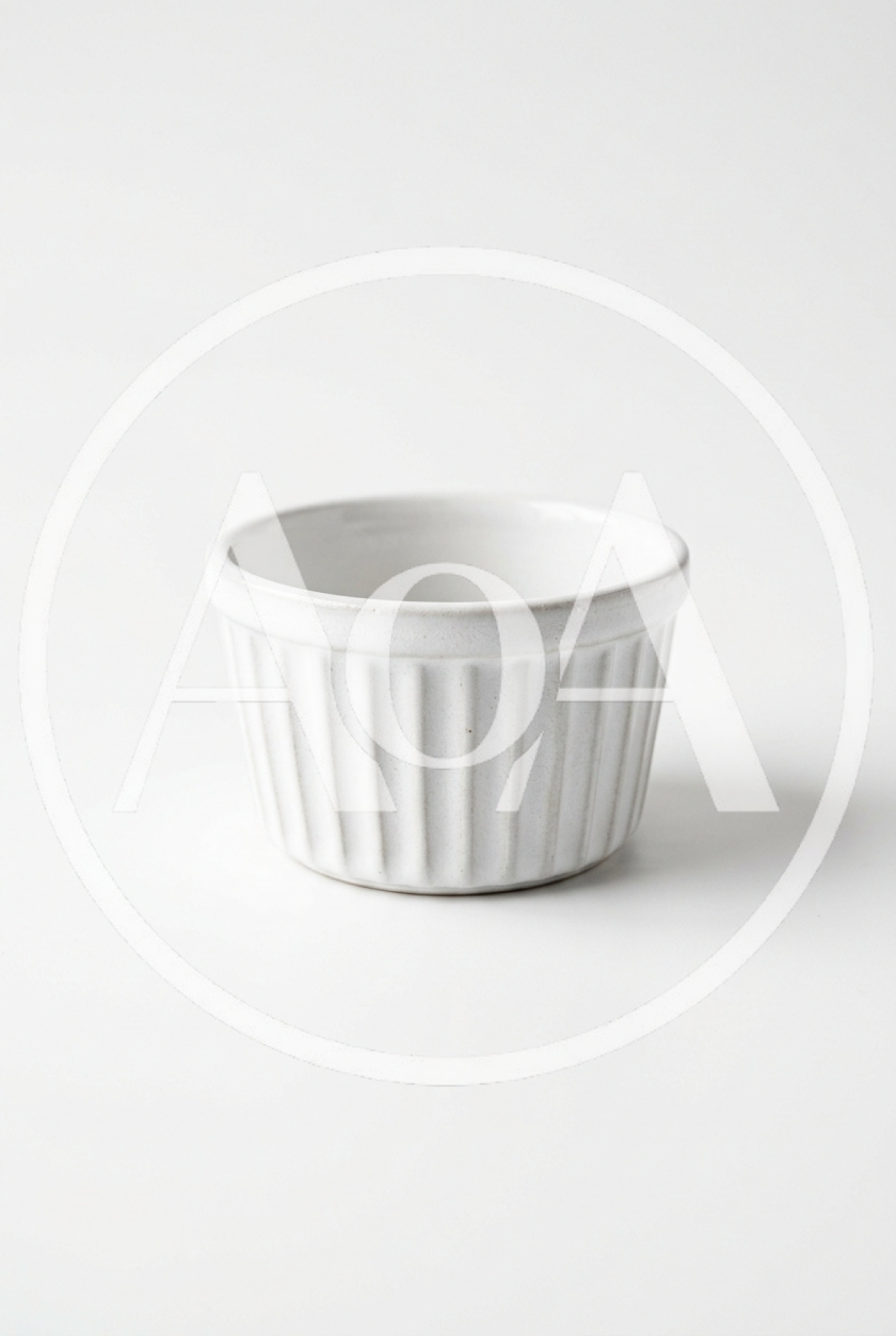 White Ceramic Ramekin Bowl On White Background