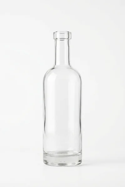 Empty Clear Glass Bottle On White Background