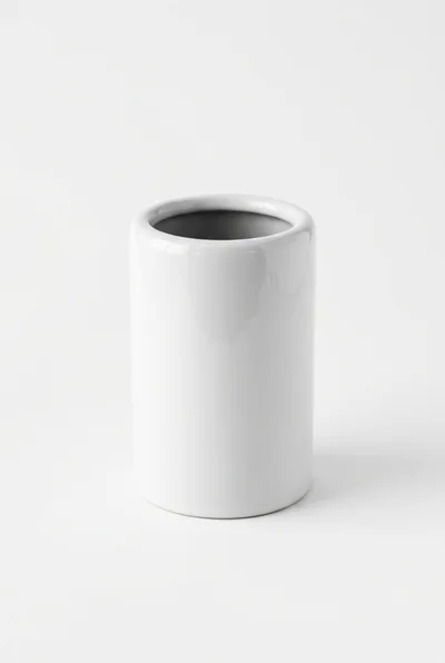 Minimalist White Ceramic Cylinder Vase On White Background