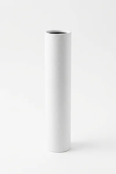 White Cardboard Mailing Tube Standing Upright