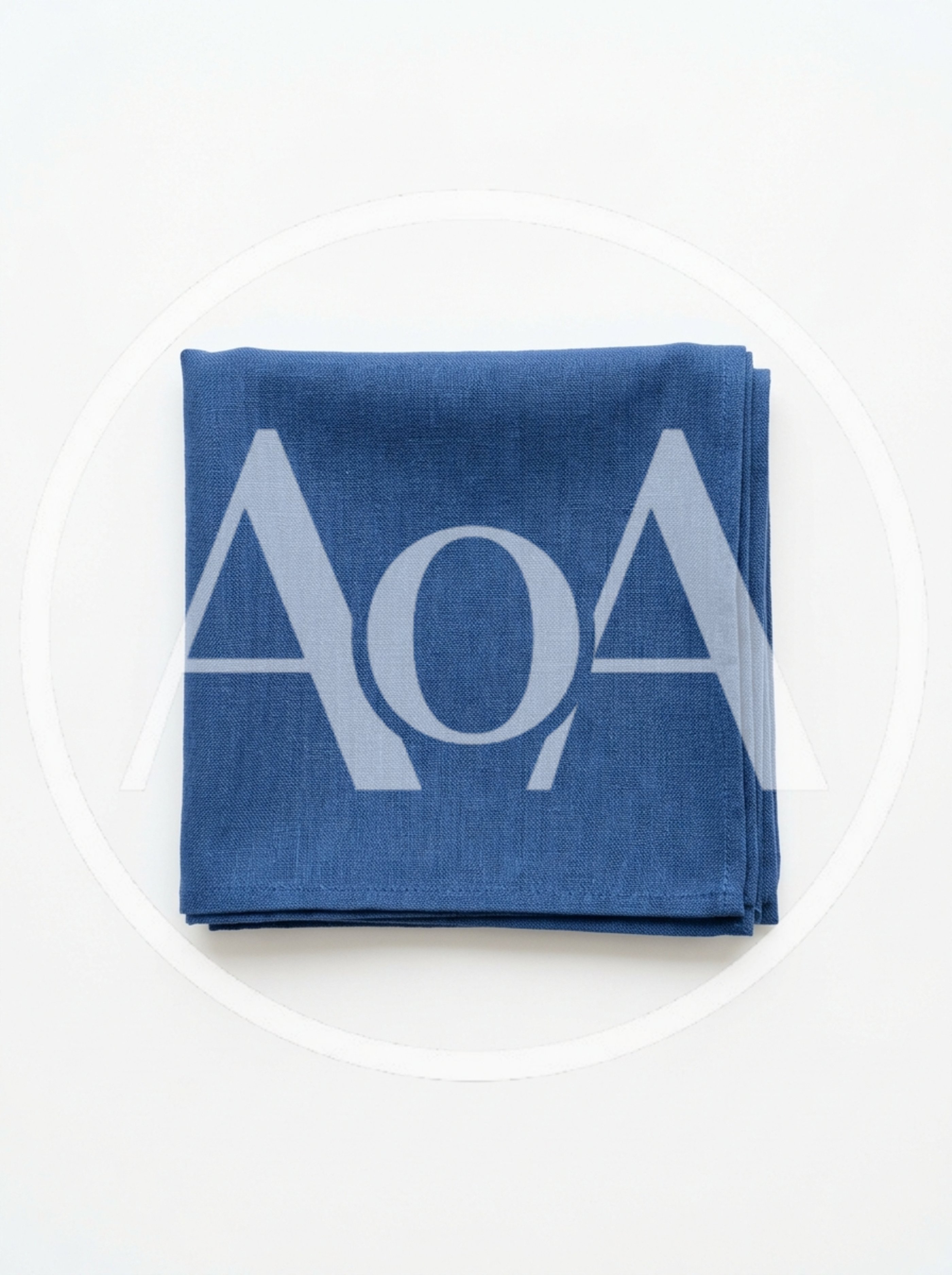 Folded Blue Linen Napkin on White Background