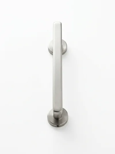 Brushed Metal Door Handle On White Background