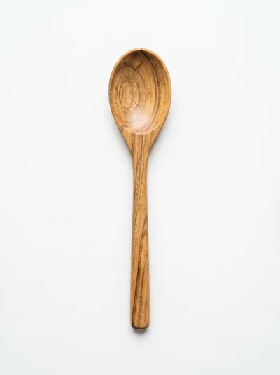 Single Wooden Spoon Isolated On White Background