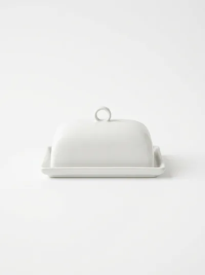 Minimalist White Ceramic Butter Dish On White Background