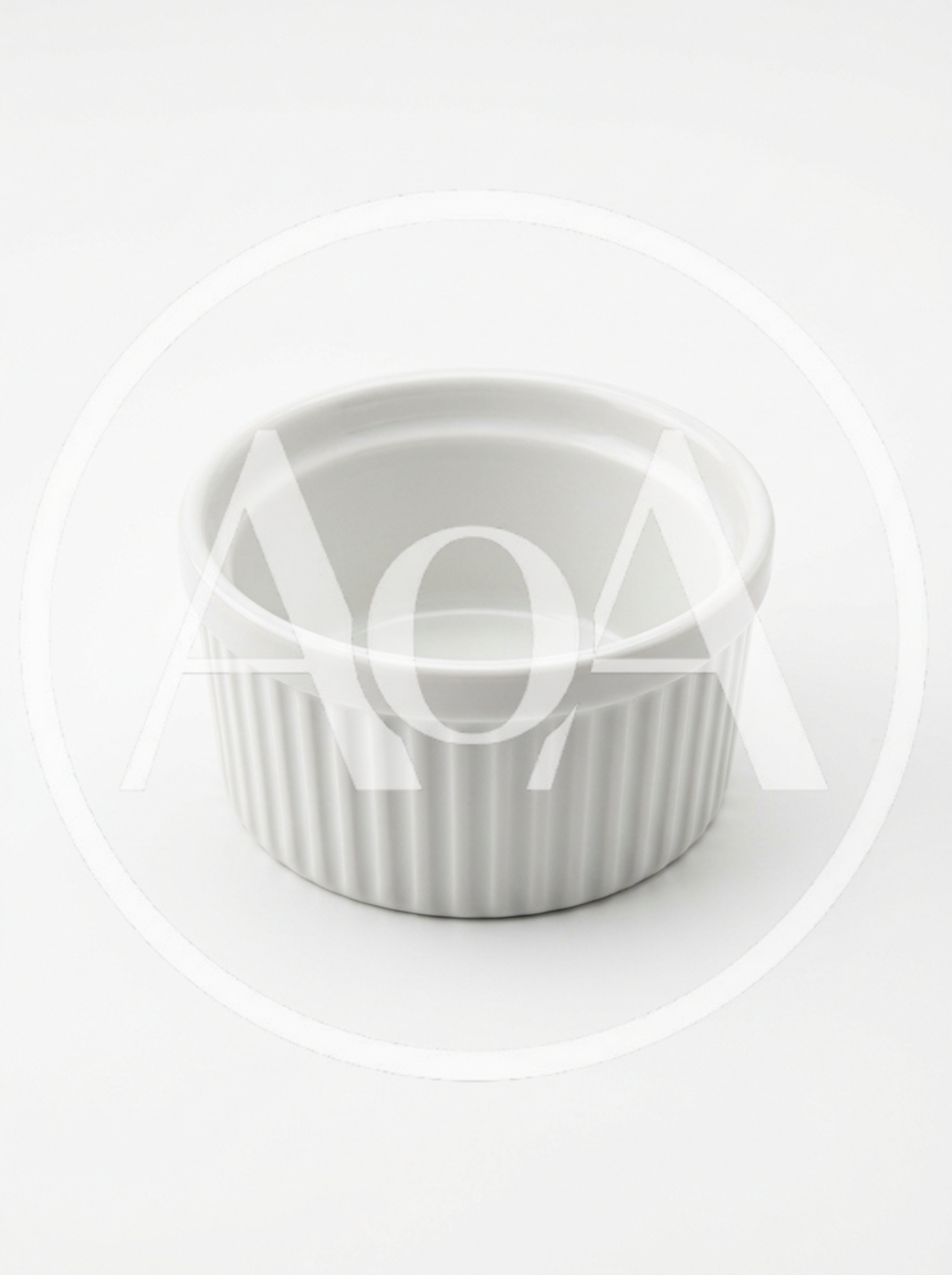 Empty White Ceramic Ramekin On A Plain Background