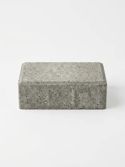 Single Gray Concrete Paver Block on White Background
