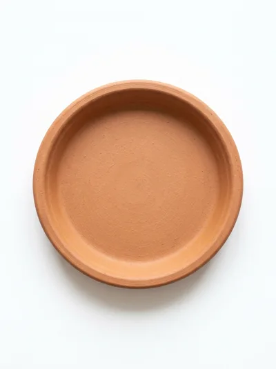 Empty Terracotta Clay Plant Saucer On White Background