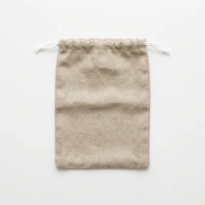 Empty Linen Drawstring Pouch on White Background