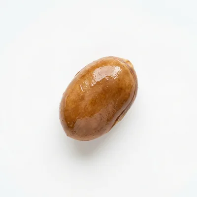 Single Peeled Roasted Chestnut Isolated On White Background