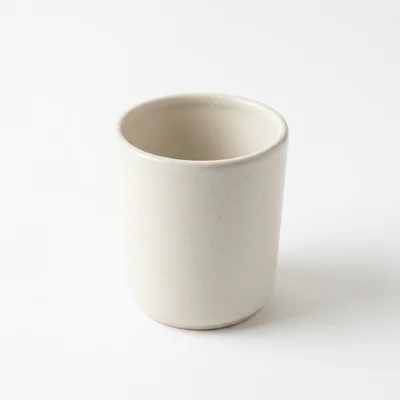 Minimalist Ceramic Cup On White Background
