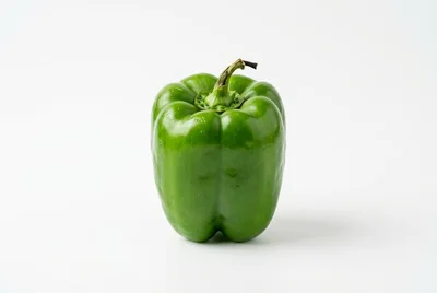 Single Fresh Green Bell Pepper On White Background