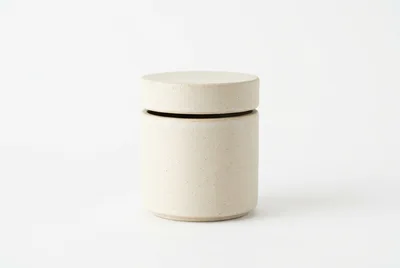 Minimalist Ceramic Storage Jar On White Background