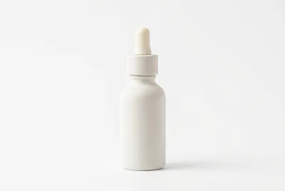 Minimalist White Dropper Bottle On White Background