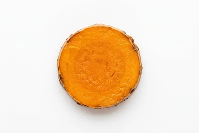 Single Slice Of Fresh Raw Turmeric Root