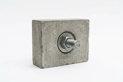 Concrete Block With Metal Bolt And Nut