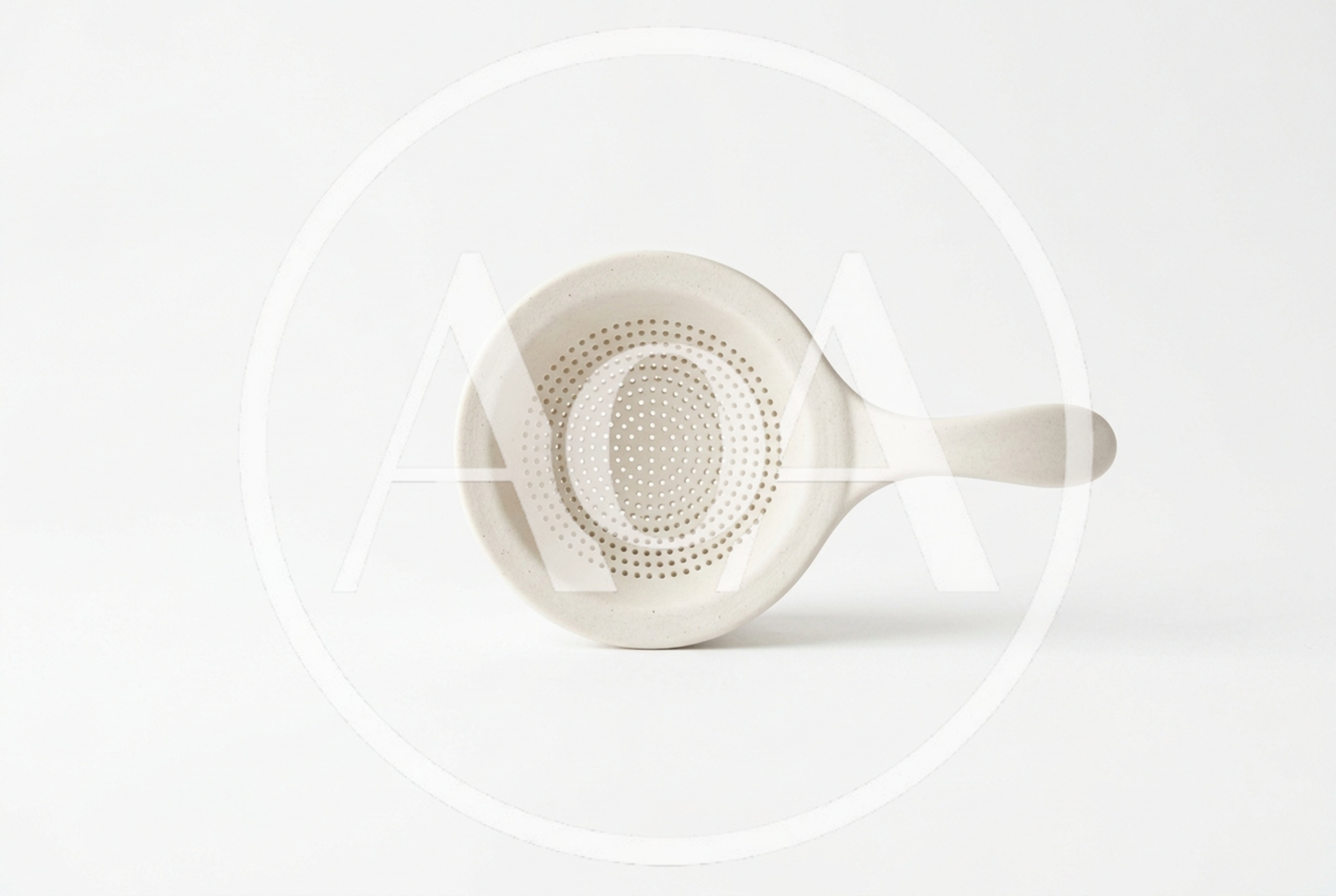 Minimalist Ceramic Tea Strainer On White Background