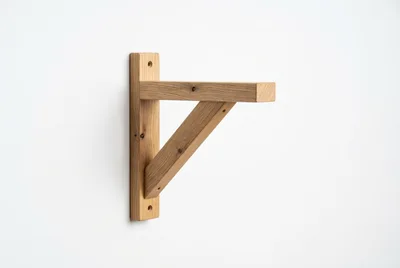 Wooden Shelf Bracket Mounted On White Wall