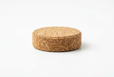 Single Round Cork Stopper On White Background