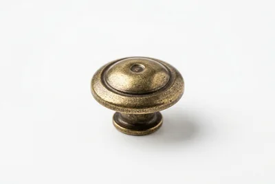 Antique Brass Cabinet Knob On White Background