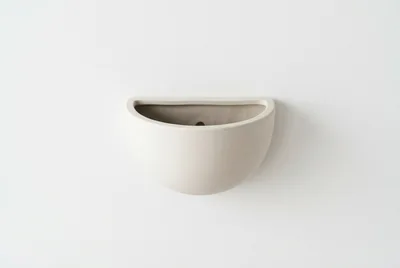 Minimalist Ceramic Wall Planter On White Background