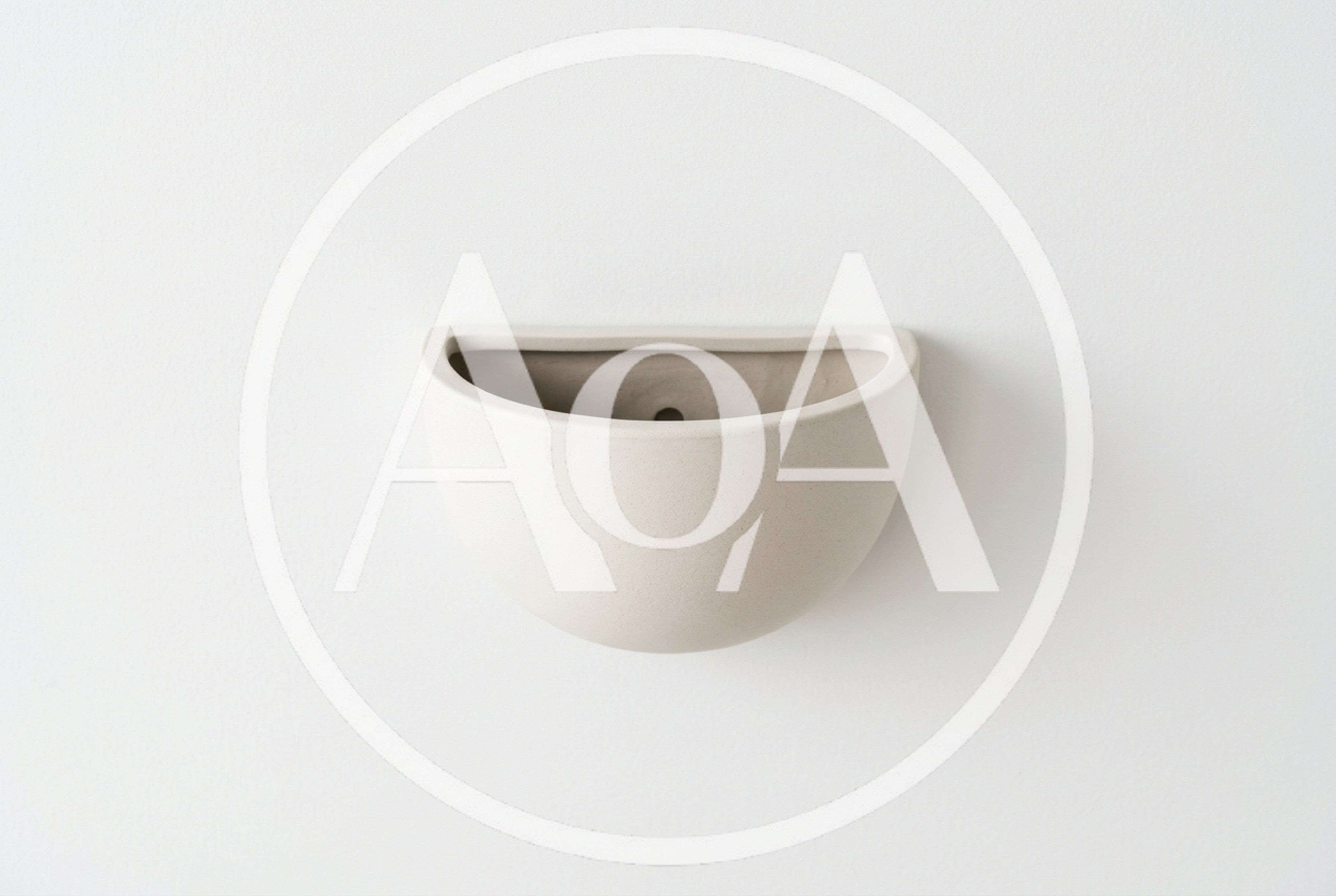 Minimalist Ceramic Wall Planter On White Background