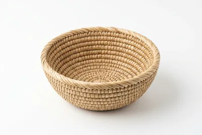 Handwoven Wicker Basket Bowl on White Background