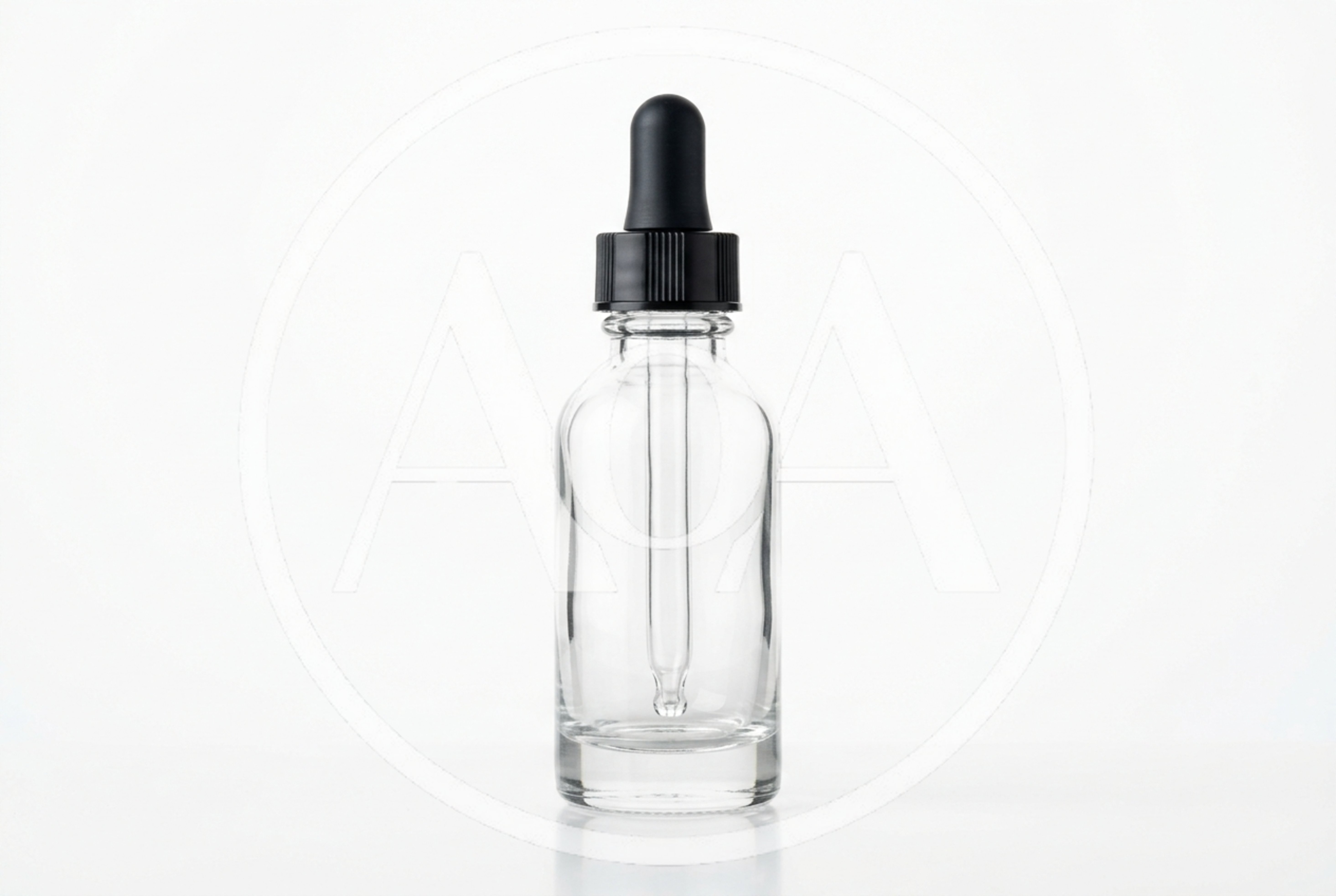 Empty Clear Glass Dropper Bottle On White Background