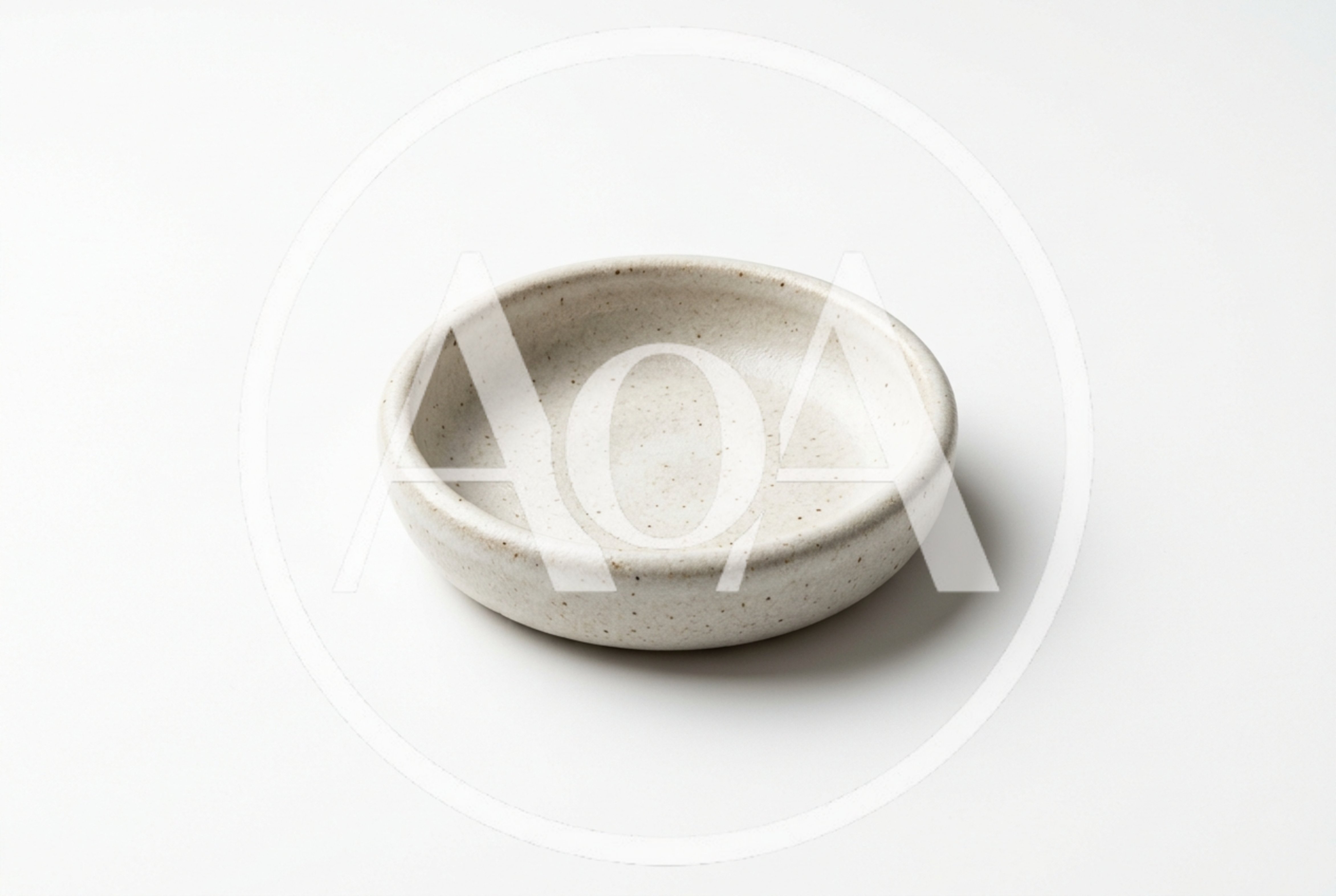 Minimalist Speckled Ceramic Bowl On White Background