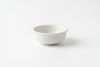 Small White Ceramic Bowl On White Background