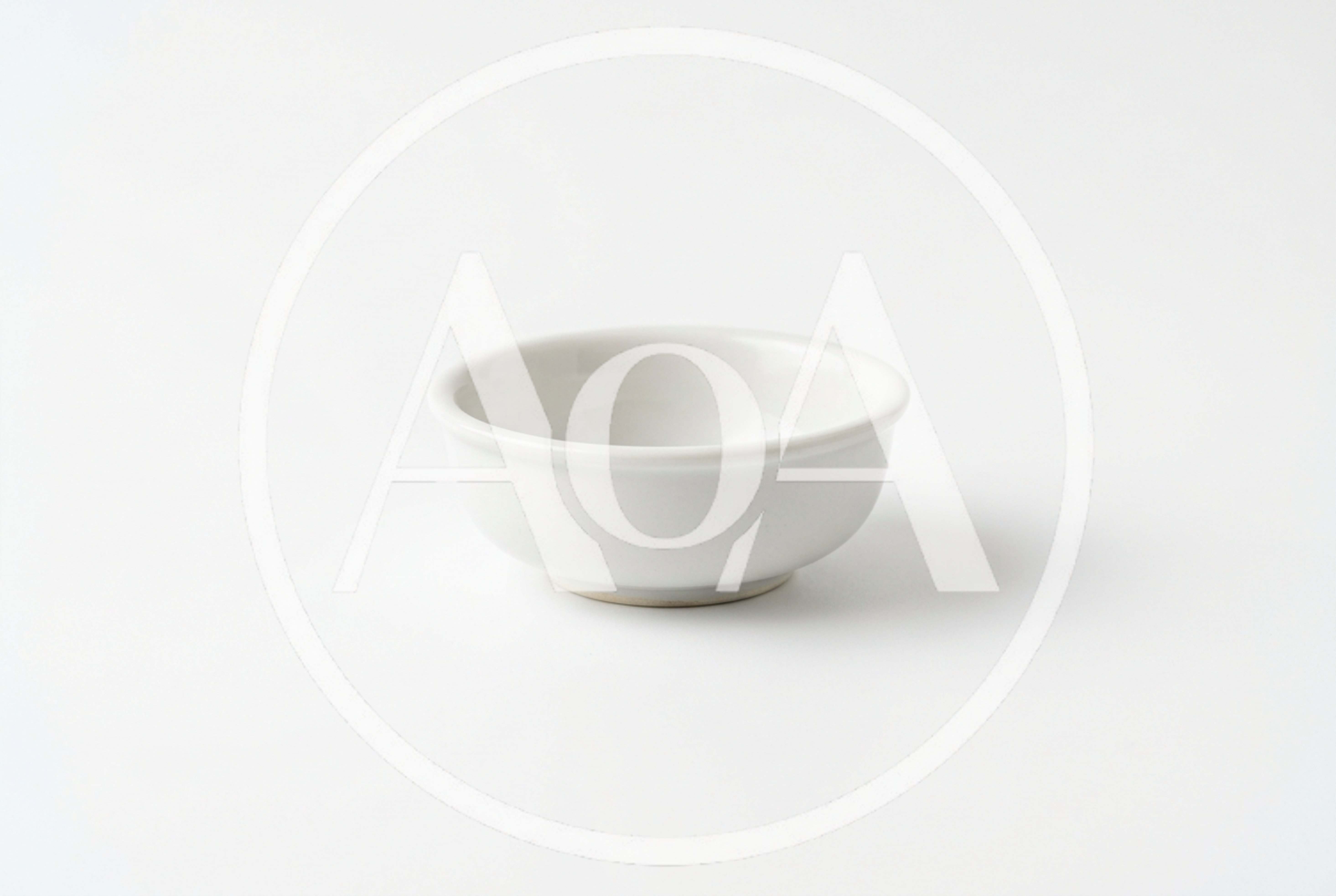 Small White Ceramic Bowl On White Background